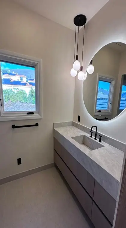 Expert General Contractor in San Francisco upgrading a residential bathroom with stylish fixtures and tiles